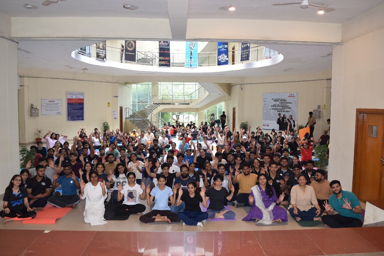 Group photo after a yoga and wellness awareness event by Asma Fitness